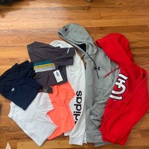 bundle of men’s size S tops